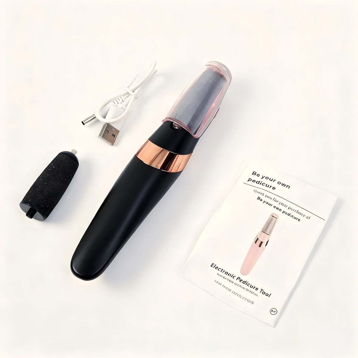 Black foot file with spare roller head, USB cable and instructions