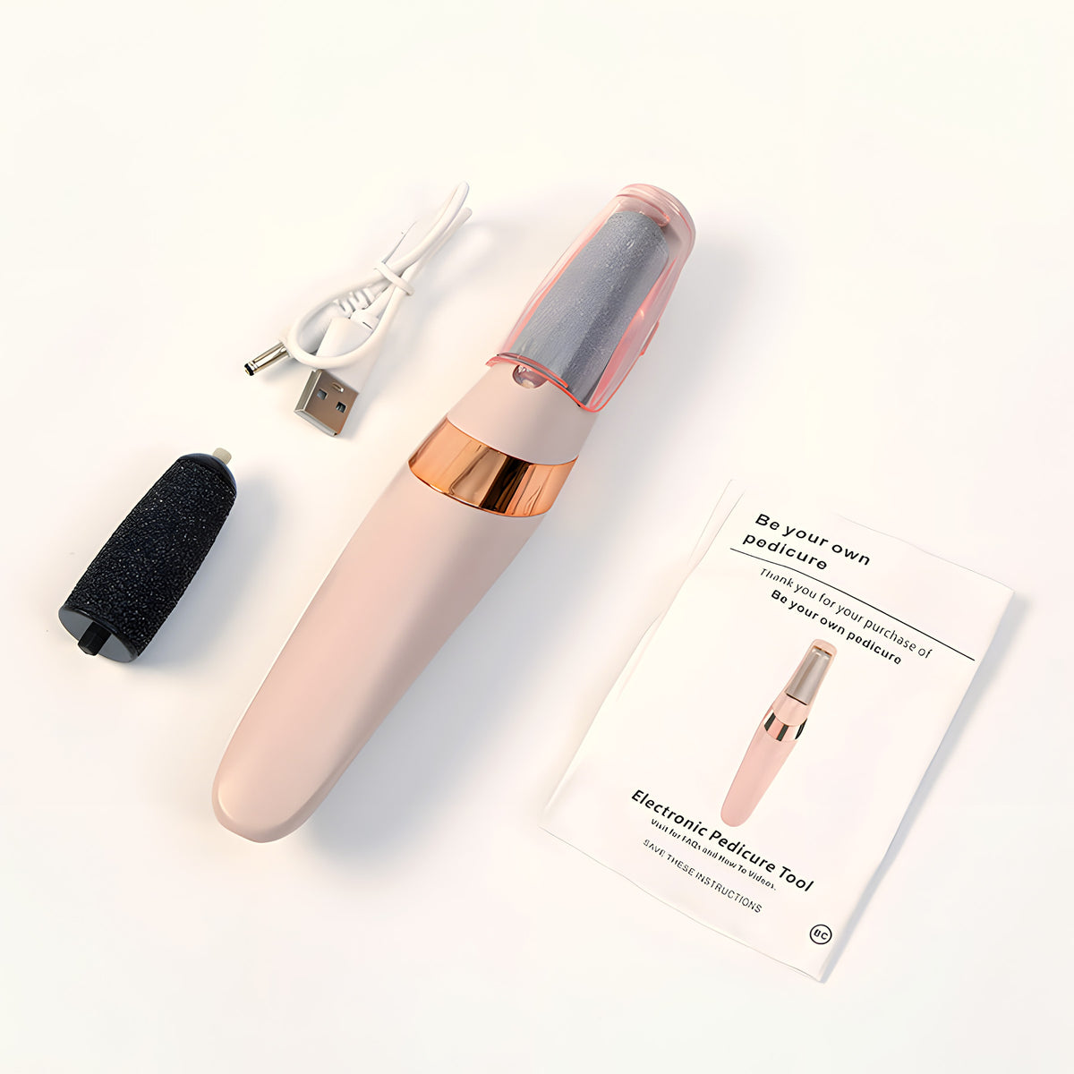 Pink foot file with spare roller head, USB cable and instructions