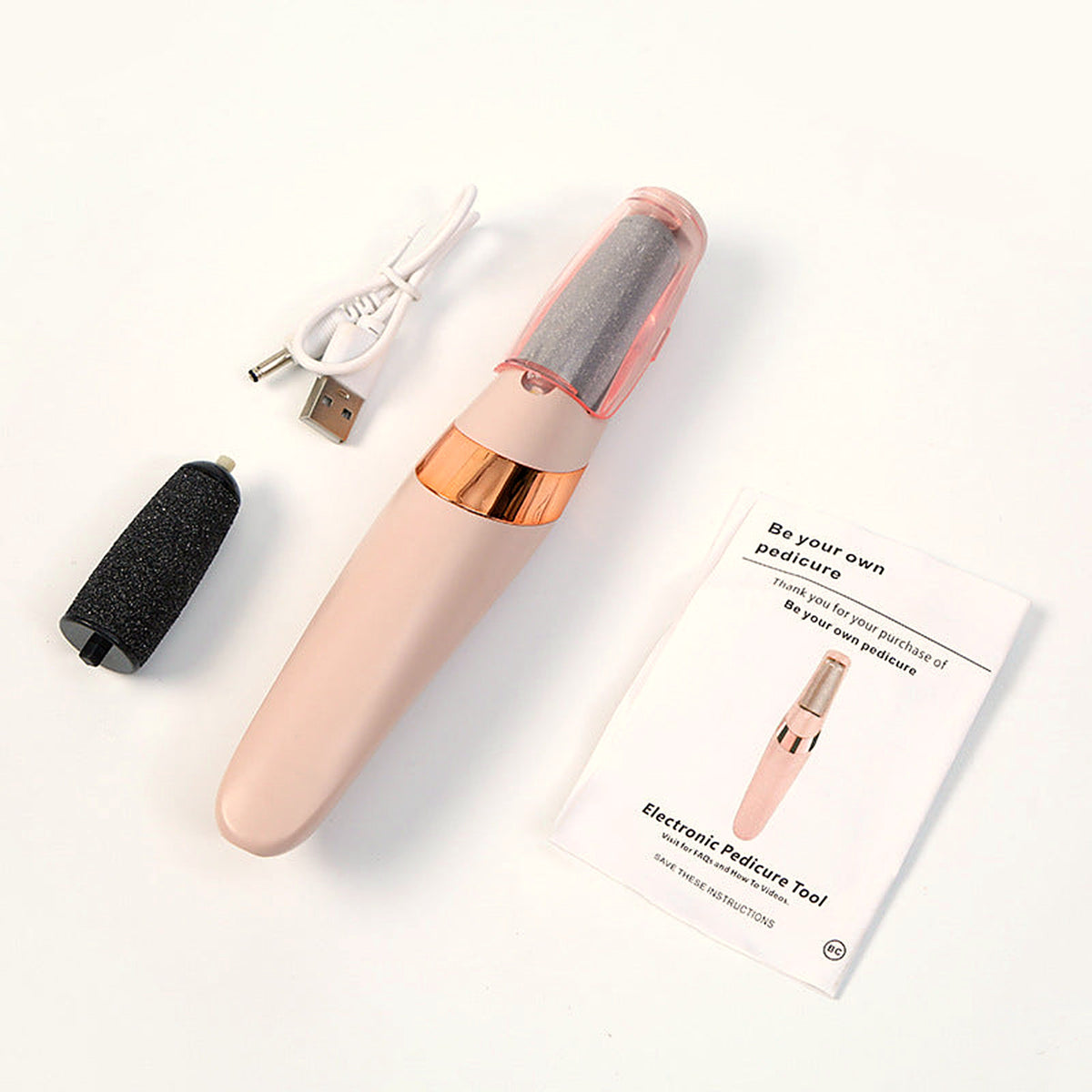 Pink foot file with spare roller head, USB cable and instructions